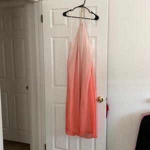 Jennifer Lopez maxi dress with low back.